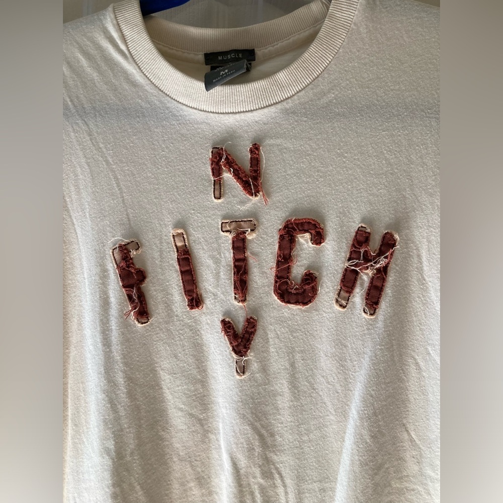 Men’s medium Abercrombie and Fitch short sleeve white T-shirt with letters